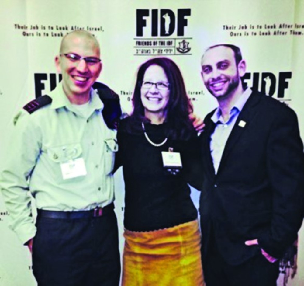 Israeli shaliach (emissary) Gilor Meshalum, left, Alyse Teitelbaum, center,  and Yehuda Fishaut at last years’ FIDF event. 